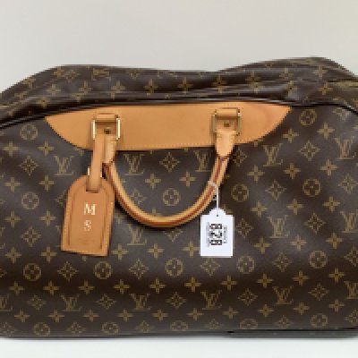 A vintage Louis Vuitton travel case Eole 60 Monogram, with dust bag. (A)