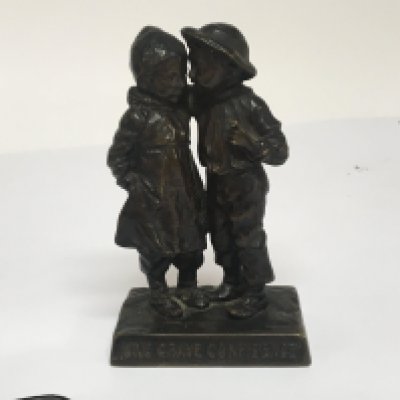 An Early 20th century Continental bronze figure of two children entitled Une Grave Confidence. Height 14cm