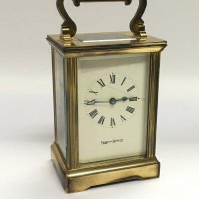 A Mappin & Webb brass cased carriage clock with key. Shipping category D.