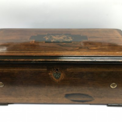 A fine quality late 19th Century inlaid music box, in need of restoration. Shipping category D.