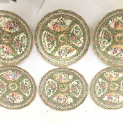 A set of six 19th Cantonese style or Cantonese decorated famille rose ribbon plates decorated with alternating panels of figures flowers and foliage diameter 22.5cm no obvious damage.