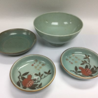 Four Celadon dishes, the largest diameter approx 16cm. Shipping category D.