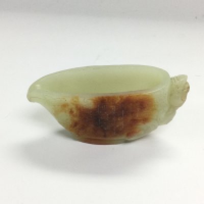 A small jade vessel with incised decoration, approx width 7.5cm. Shipping category A.
