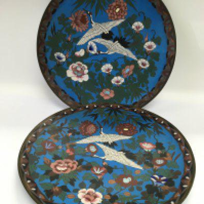A pair of cloisonne dishes decorated with storks, approx diameter 30cm. Shipping category D.