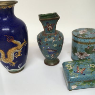 A collection of cloisonn&eacute; a jar and cover two vases and a box with a hinged lid.