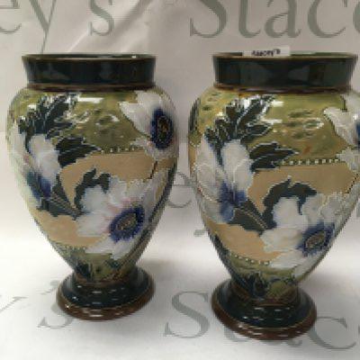 A pair of Doulton vases decorated with flowers and foliage. 20 cm no damage or restoration .