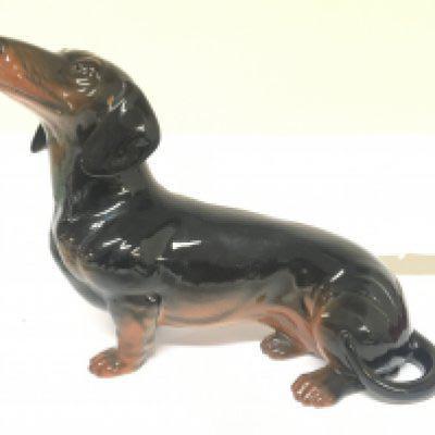 A large size Beswick ceramic figure of a Dachshund dog. No obvious damage or restoration length 38cm approximately. NO RESERVE