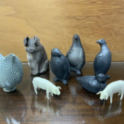 a small collection of studio ceramic animals including Karen Lainson seated pig. (8). NO RESERVE