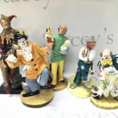 Royal Doulton porcelain figures including The Jester, The Clown, Punch and Judy man etc. no obvious damage or restoration.this lot cannot be posted