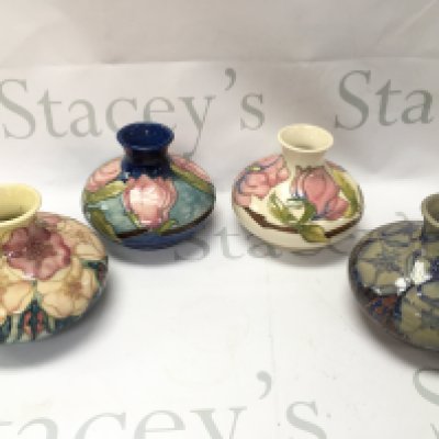 Moorcroft squat vases , including Magnolia pattern, two limited edition of 100. No obvious damage or restoration This lot cannot be posted