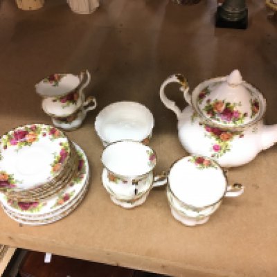 A Royal Albert country rose teaset including plates, cups , tea jug. This lot cannot be posted