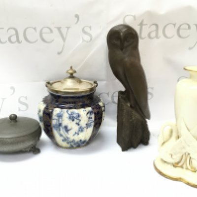A collection of items including a Cold cast owl figure, ceramic biscuit barrel, swan vase , pewter pot, 1914 shell case trench art vase, royal albert daffodil cup and saucers This lot cannot be posted