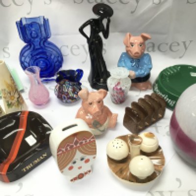 A collection of ceramics including Wade pigs, Wade Truman and Sporting Life porcelain ashtrays, Purbeck swanage vases, Caithness vase, Mdina vase , Carltonware money bank etc