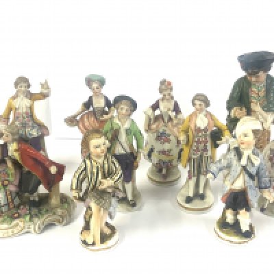 A small collection of small European porcelain figures. (D)