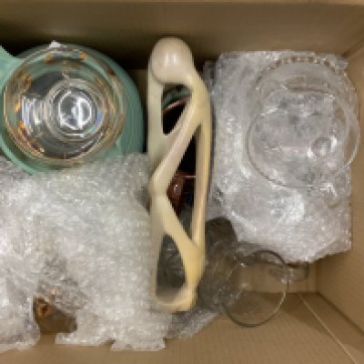 A large colllection of various ceramics and odds. (D) 13 boxes.