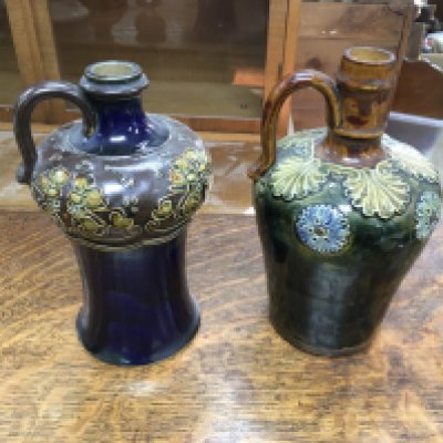 A pair of Doulton stoneware vases.