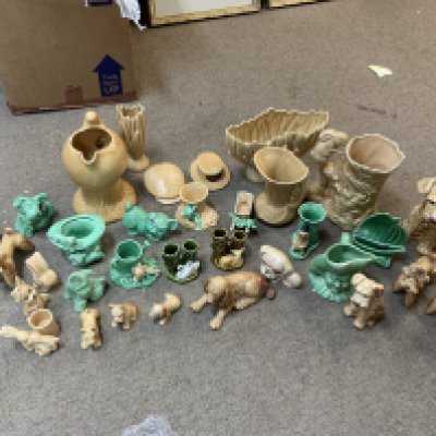 A large collection of Sylvac pottery together with additional ceramic figurines.