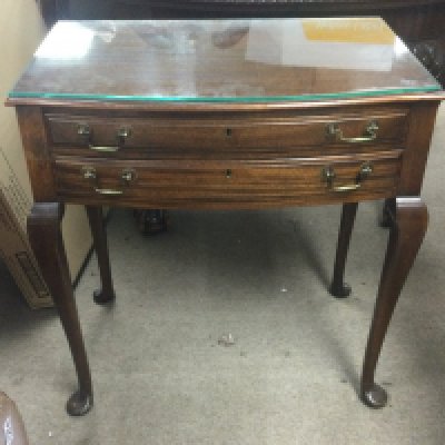 A cutlery table including Sheffield plate cutlery. Dimensions 45x70x74cm