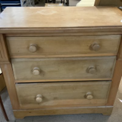 A Late Victorian pine chest of drawers.