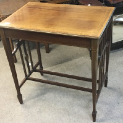 An Edwardian inlaid Mahogany occasional table with a rectangular top on shaped supports. NO RESERVE