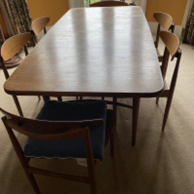 A Vintage G PLAN Teak Dining Table - Danish Range by Kfod Larsen - Mid Century Modern together with 10 matching K.Larsen dining chairs. (D)