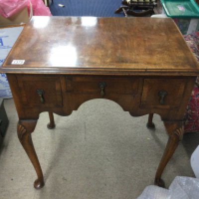 A mahogany 3 draw dressing table. Approx 66cmx71cm.