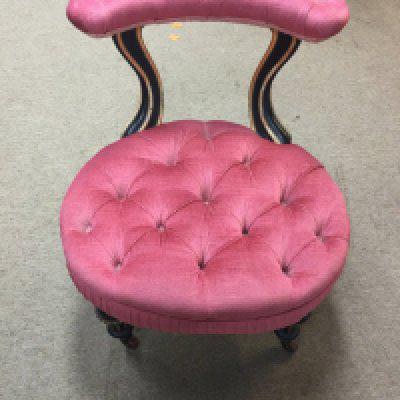A mid Victorian boudoir chair.