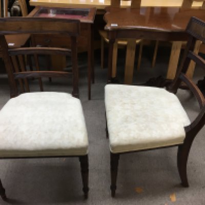 Four Victorian walnut chairs.