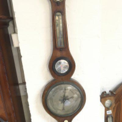 A Late George III mahogany barometer with a boxwood and ebony inlaid edge some restoration required sold without reserve.