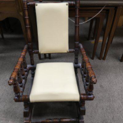 A walnut childs Rocking chair