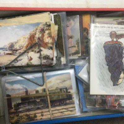 Three file boxes containing a large quantity of mixed postcards including a range of Tucks postcards Express locomotives and vintage steam trains and many other post cards (3) NO RESERVE