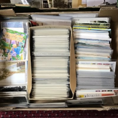 Three boxes containing a good mixed collection of Vintage and comical post cards many in plastic sleeves and some retrospective copy cards (3). NO RESERVE
