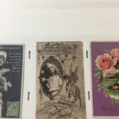 A box containing a collection of albums of postcards including a well presented album of Vintage greetings and Christmas cards albums containing vintage black and white postcards depicting Shipping cards and others.