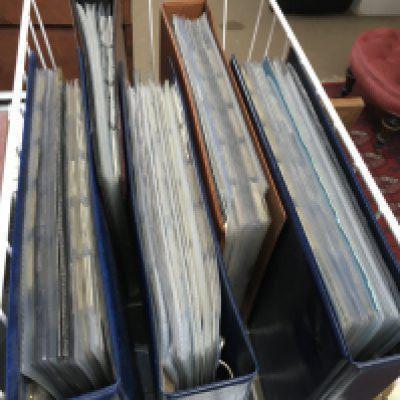 Five cigarette card albums , mostly complete sets of Wills, Players etc . Also containing cigar bands and phone cards