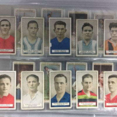 An album of sports related cigarette cards including examples by Ogdens, Gallaher, John Player and others. Shipping category B.