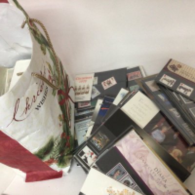 A bag containing a large quantity of British Pictorial Presentation pack stamps.