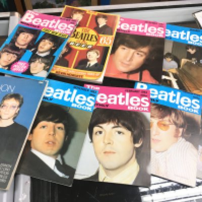 A collection of vintage Beatles monthly magazines, postage category B