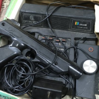 A boxed vintage Optim sport tv game console. Postage category B