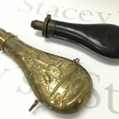 Powder flasks including a brass example. Postage category B