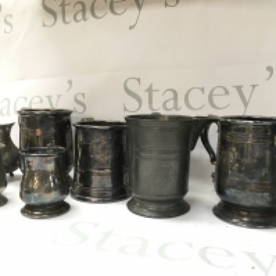 A collection of silver plate and pewter tankards including an 18th century George III pint tankard. Postage catB