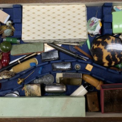 A case of small vintage novelty items etc.