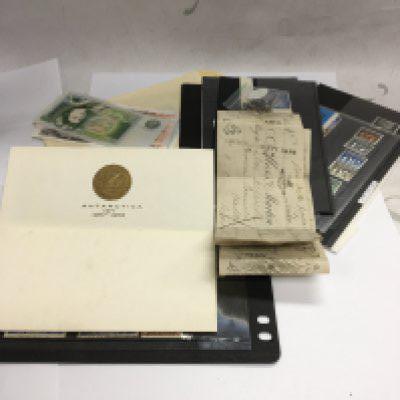 WITHDRAWN - A mixed lot of items including stamps, an Antarctica headed paper and notes.