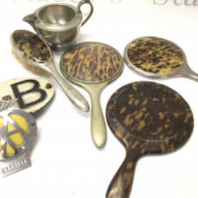 A mixed lot including tortoiseshell mirrors, vintage AA badges,