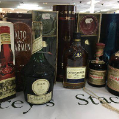 A collection of alcohol including brandy Drambuie and grand Marnier .(10) .