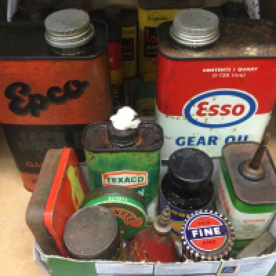 A collection of vintage motoring related tins including Esso gear oil, Epco oil and others. Shipping category D.