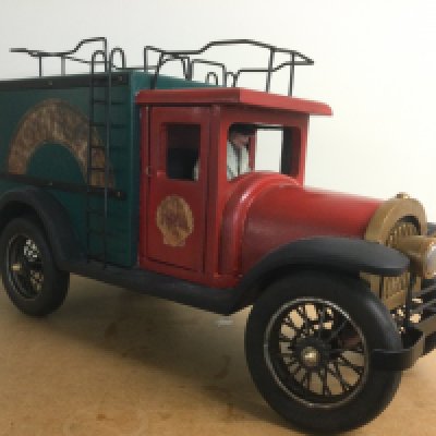 A scratch built painted wooden model of a vintage Shell van and driver, approx length 61cm. Shipping category D.