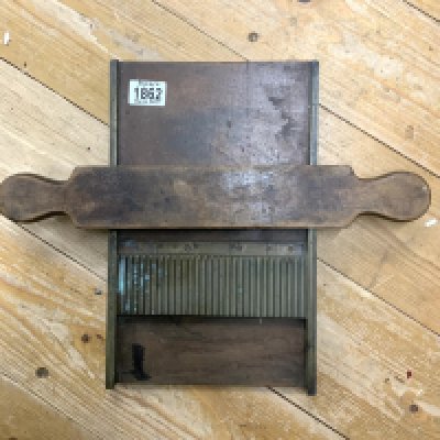 An antique brass and mahogany pill makers board. (D)