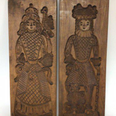 Two large carved wood ginger bread moulds in the form of figures hight 60cm (2)