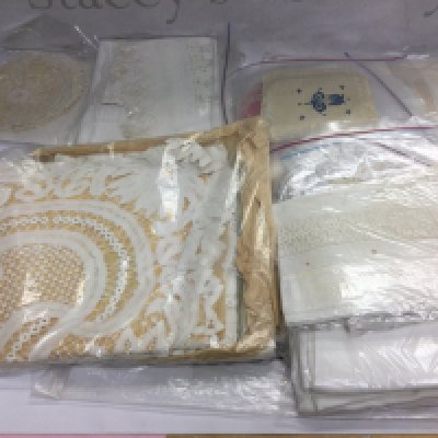 A small collection of lace. Shipping category C.