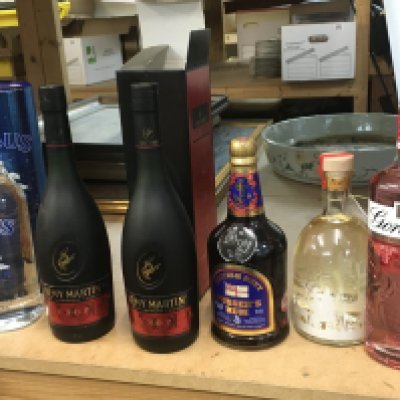 A collection of spirits including Remy Martin fine champagne cognac, Gordons premium pink gin, Ursus imported vodka etc . This lot cannot be posted